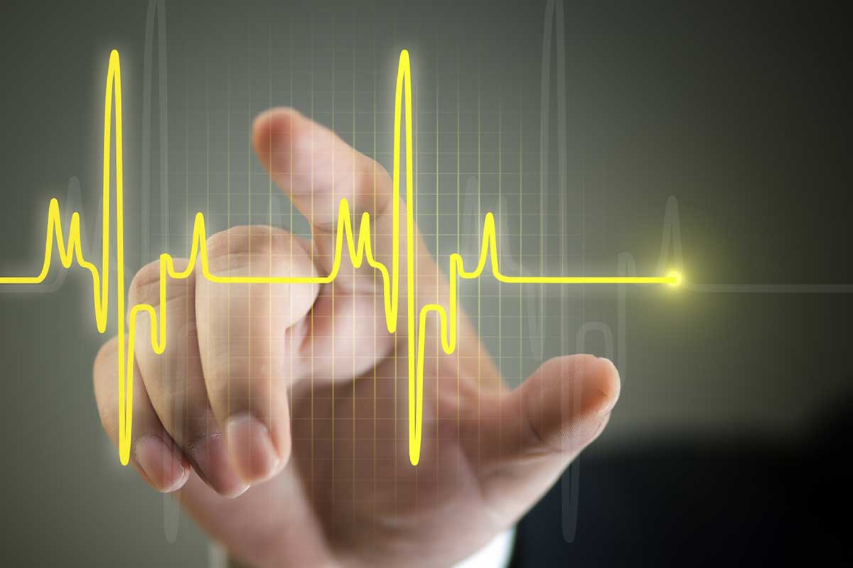 oral-magnesiu-study-ECG-with-pointing-finger